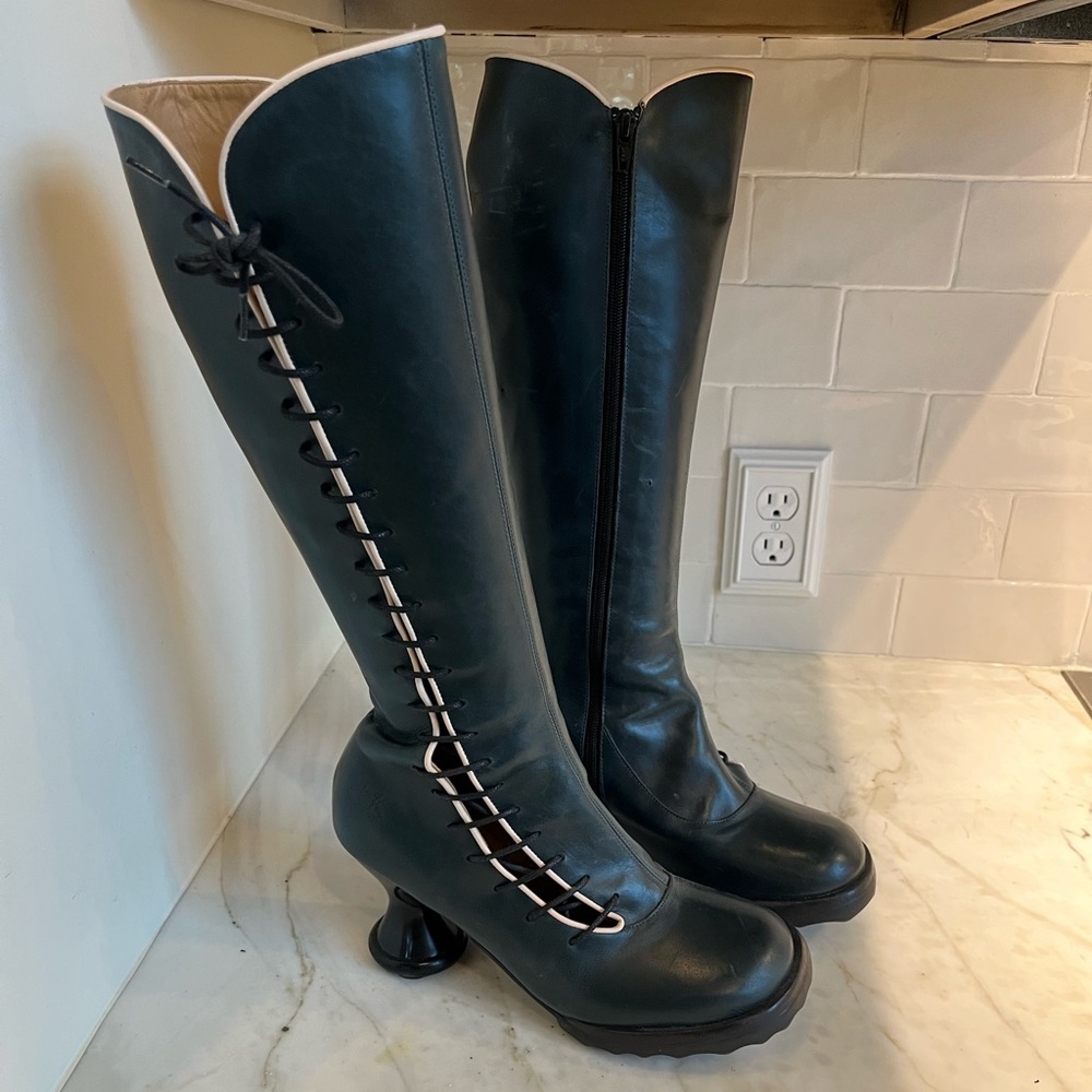 John Fluevog tall boots. Dark green with white trim and black laces.